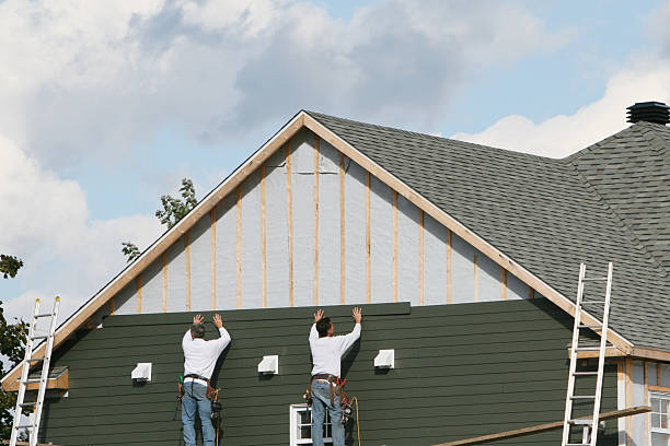 Professional Emergency Siding Repair technician working in Coatesville, PA